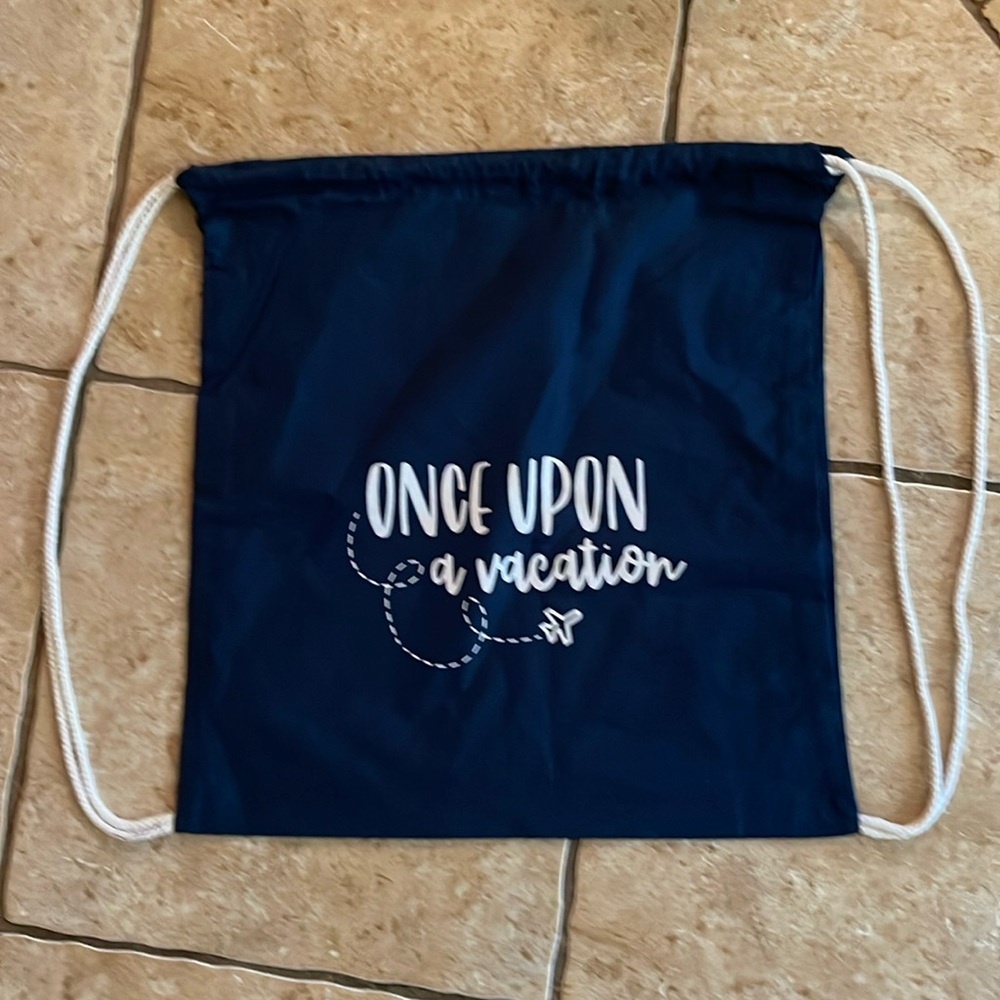 🛍5 for $20 🛍️ 
String bag… Once upon a vacation logo, 18“ x 15“ blue and white.